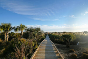 Wooden walkway leading to the ocean in Sunset Beach, Brunswick County North Carolina
