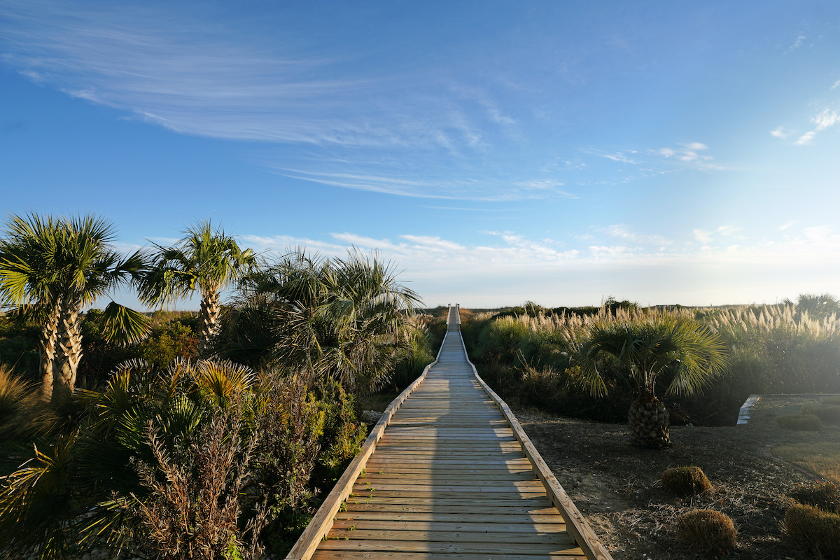 Wooden walkway leading to the ocean in Sunset Beach, Brunswick County North Carolina