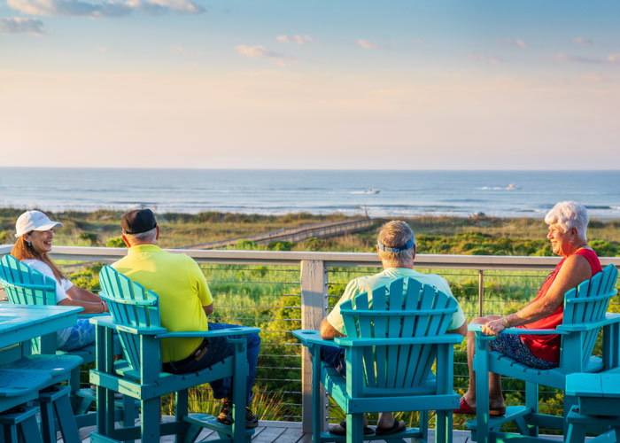 Residents enjoying coastal living with ocean views near Kingfish Bay in Calabash, North Carolina